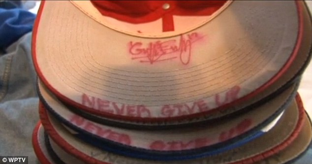Motivated: Griffin writes his motto, 'Never give up', inside the rim of his baseball caps each season to remind him of what he is trying to achieve