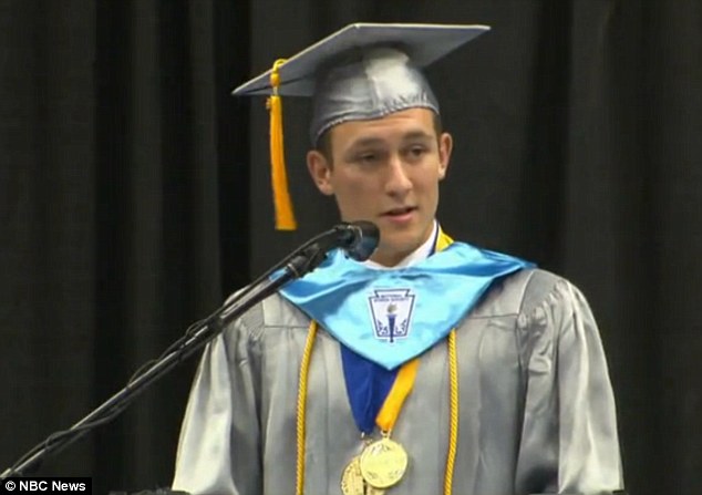 Inspiration: Homeless teenager Griffin Furlong gives his valedictorian speech on Wednesday after overcoming hardships to graduate with a 4.65 average