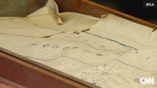 The curator said that the parchment included in the top section is either a blueprint or a map, and that it is potentially a copy of a much older document.