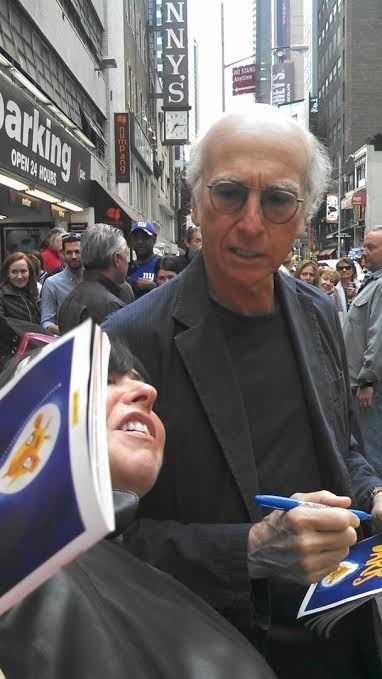 This selfie that Larry David is just ecstatic to appear in.