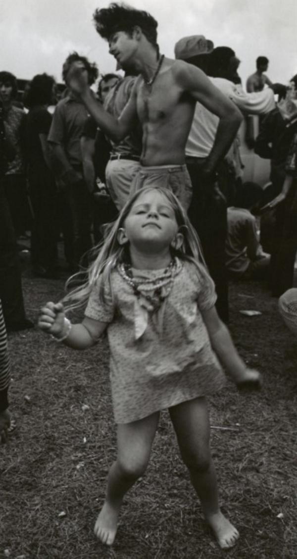 A little girl dancing in Woodstock in 1969.