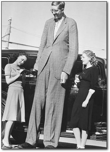 The tallest person in history Robert Wadlow in the 1930s. Wadlow suffered from hyperplasia,  which caused him to never stop growing.
