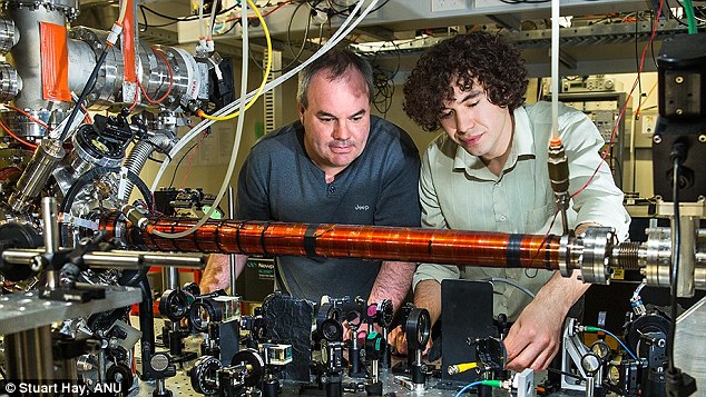 Physicists at the Australian National University recently conducted what is known as the John Wheeler's delayed-choice thought experiment . Pictured is Associate Professor Andrew Truscott (left) with PhD student Roman Khakimov