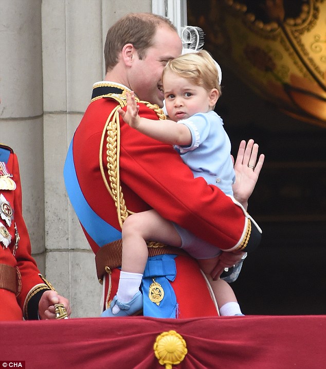 Here, Prince George - who turns two next month - shyly waves to the crowds of people gathered below