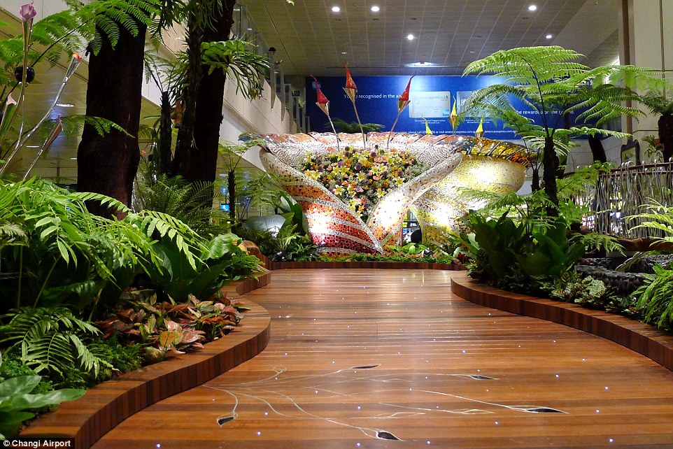 The entrance to the butterfly garden is enchanting, yet passengers must remember they have a flight to catch
