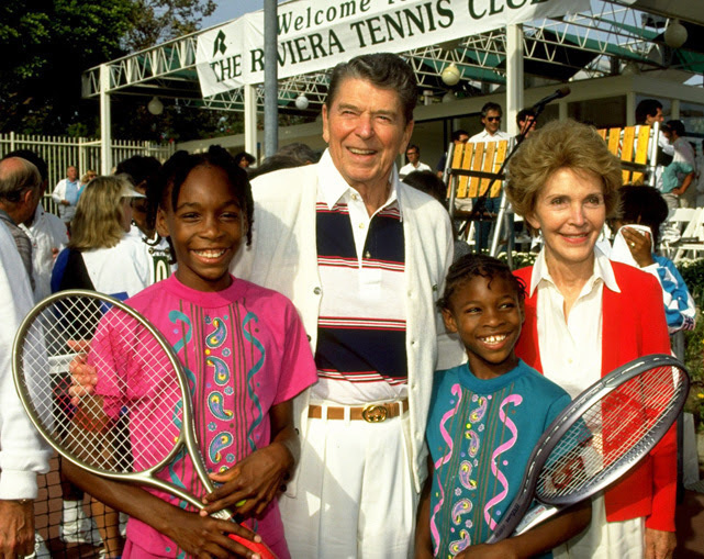 A very young Serena and Venus Williams posing for a photo with former president Ronald Reagan and first lady Nancy Reagan.