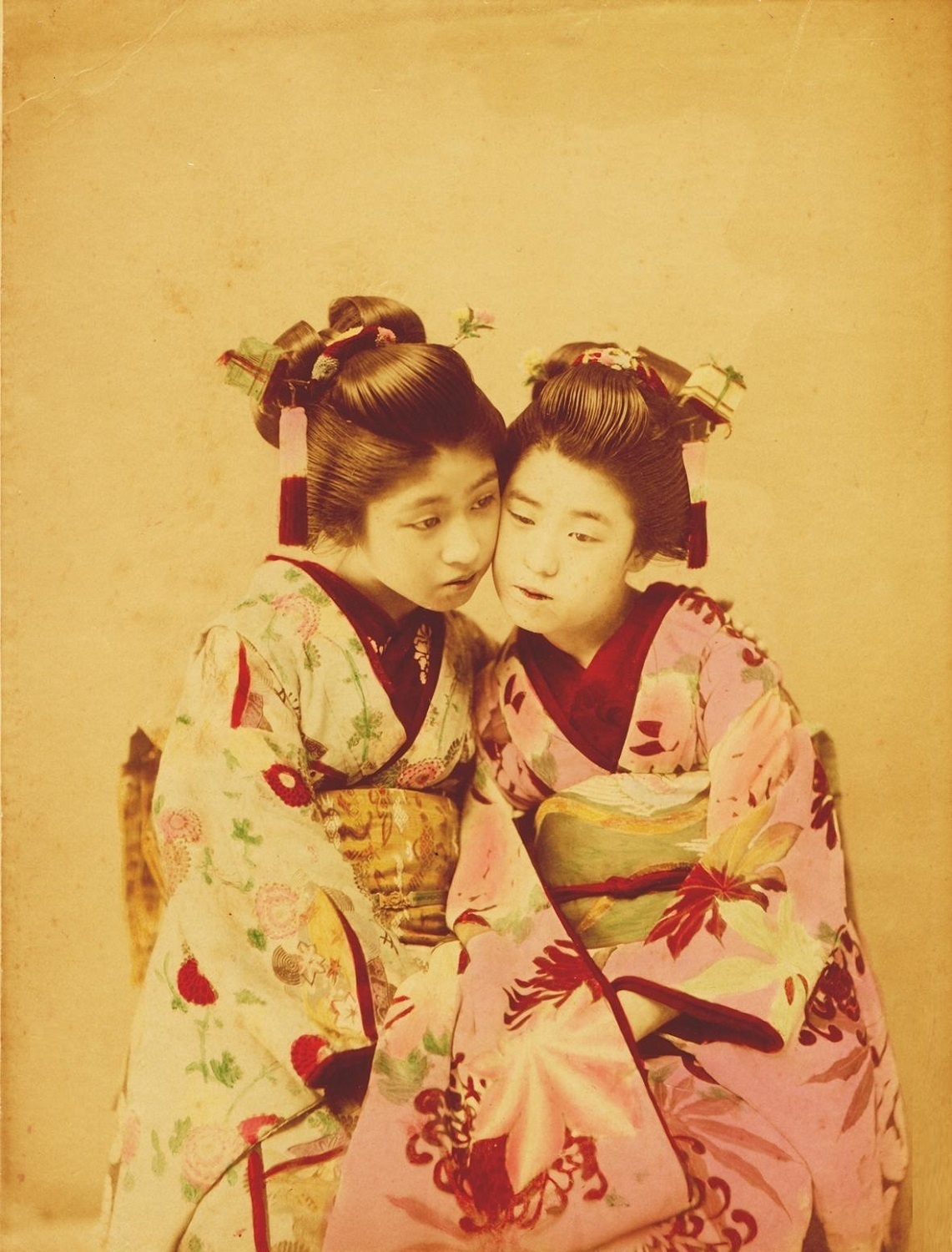 Japanese girls hanging out in beautiful kimonos in 1887.