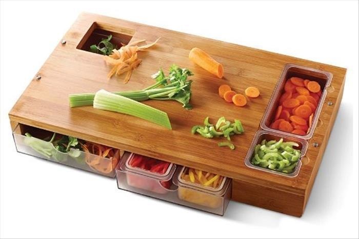 The cutting board that stores food inside of it.