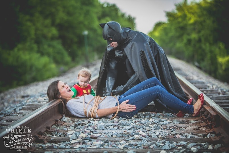 Wisconsin-based photographer Eric Thiele took the superhero-inspired photos of Mike and Roxanne Daly and their toddler son, and one of the pictures blew up after being posted on Facebook by Unilad.