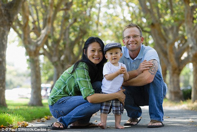 Research has found humans today are taller and more intelligent than their ancestors, and the cause has been linked to the rise in more genetically diverse populations. And those born to parents from different races and cultures also tend to have higher levels of education. A stock image of a mixed-race family is pictured