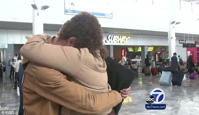 Tearful: Hope Holland and her 18-year-old son Jonathan saw each other for the first time in 15 years this week after Jonathan was kidnapped by his father in 2000