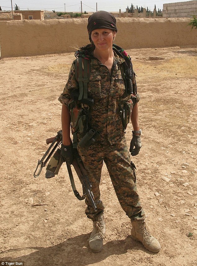 Fierce fighter: Tiger Sun, 46, left Canada in March to fight with the Kurdish People's Protections Units in Syria