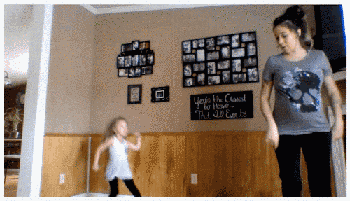 While 8 Months Pregnant, This Mom Had An Epic Living Room Dance Sesh With Her Daughter