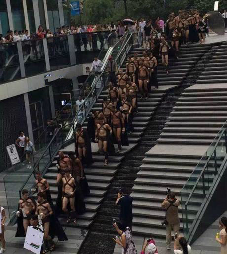 Having no idea why the Spartans were in China, passersby inevitably got curious and gathered when they walked by a perfect catwalk-y staircase.