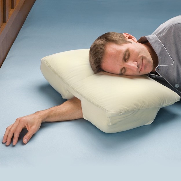 Or this pillow that solves your annoying side-sleeping arm problems.