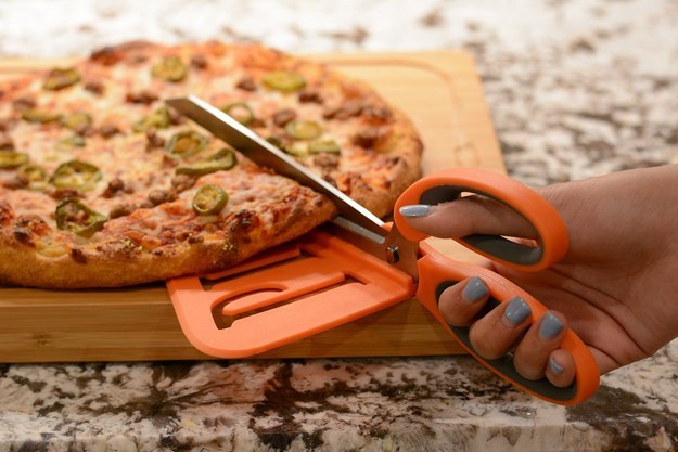 A pair of scissors that can cut through pizza.