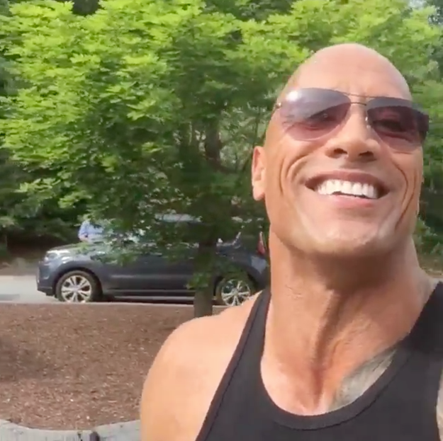 The smile says it all... The Rock is probably playing with us for some new flick.