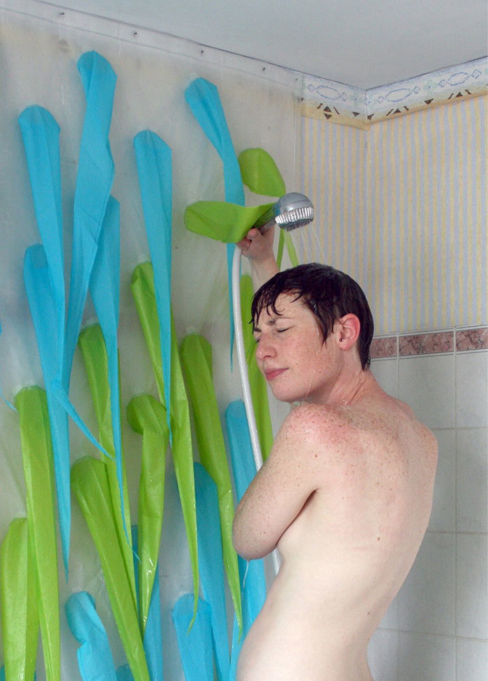 A spiky shower curtain that kicks you our after five minutes to save water.