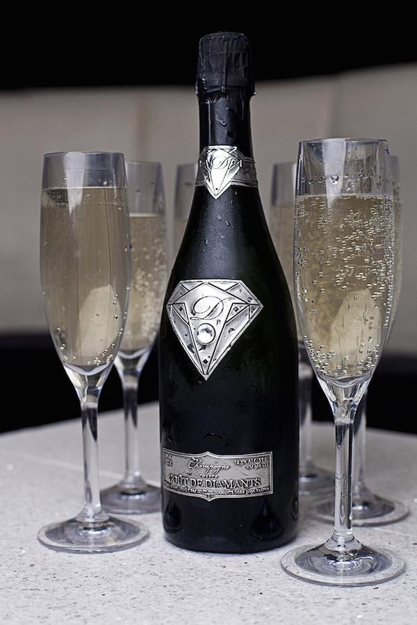 Most Expensive Bottle of Champagne: Goût de Diamants (Taste of Diamonds) Limited Edition
Price: $1,867,000

Made from 100% Grand Cru grapes, Goût de Diamants is produced at the 8-hectare, family-owned, Champagne Chapuy in Oger, and some varieties are aged for a minimum of 40 months. But don’t go looking for this in stores, you won’t find it. This brand sells exclusively to high-end bars, restaurants, hotels, and private clients. Each bottle of Goût de Diamants is adorned with a brilliant cut Swarovski crystal in the centre of a diamond-shaped pewter design resembling the Superman logo.