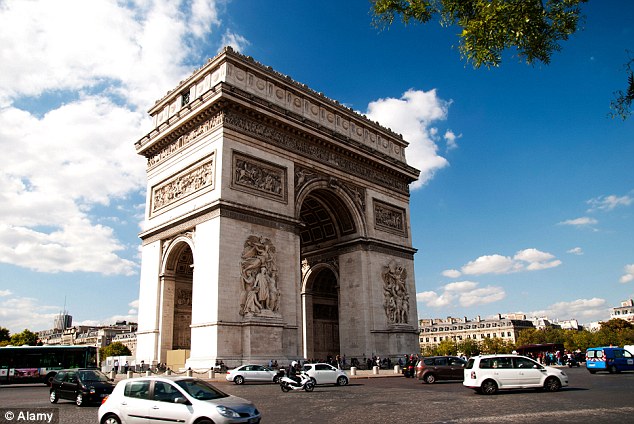 Visitors to Paris will still be able to see the real Arc de Triomphe, pictured, at the end of the Champs-Élysées