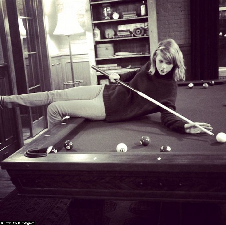 Game on: Taylor has installed a pool table, and she loves to shoot a few balls with her female friends