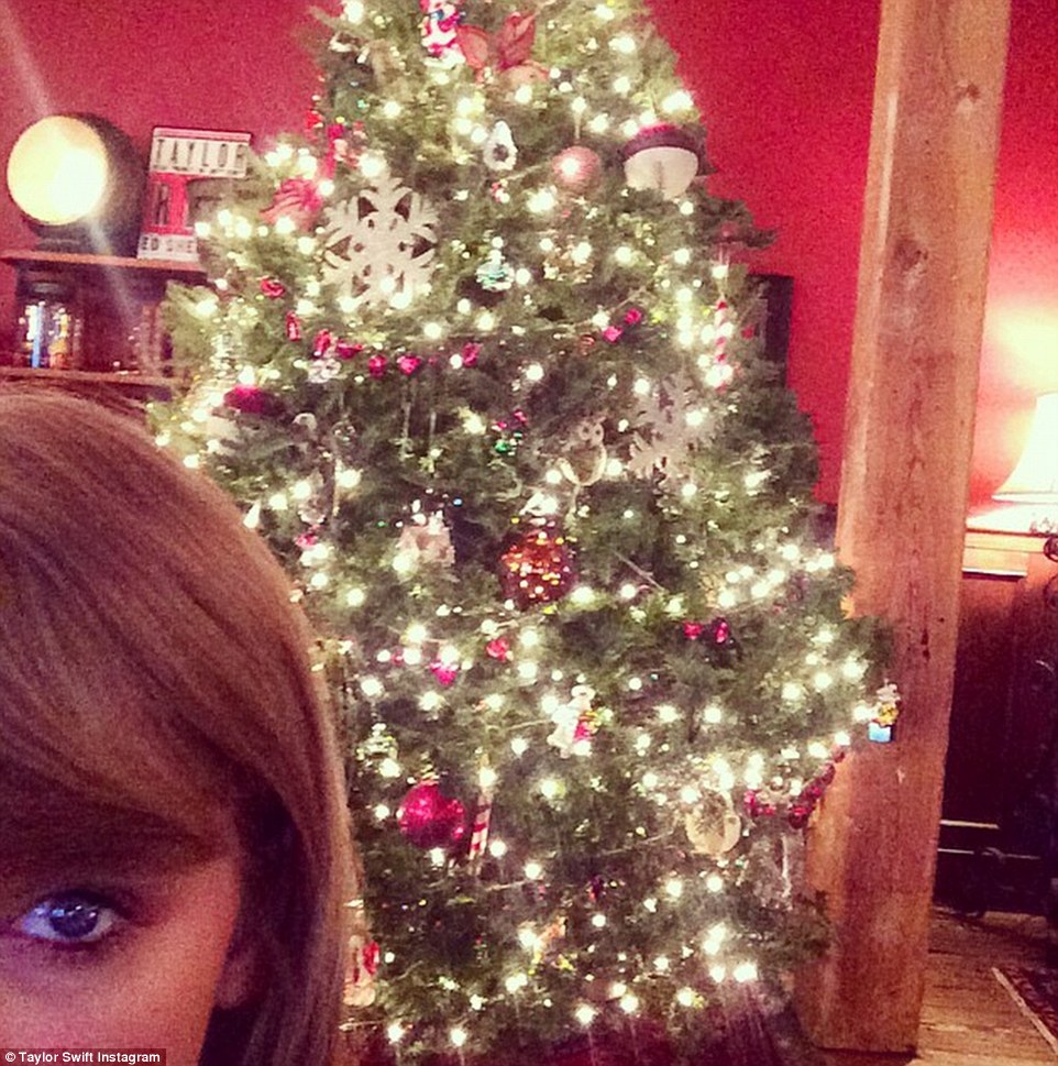 Getting into the Christmas spirit: Taylor shows off her festive tree in the New York loft apartment, in the run-up to last year's festivities
