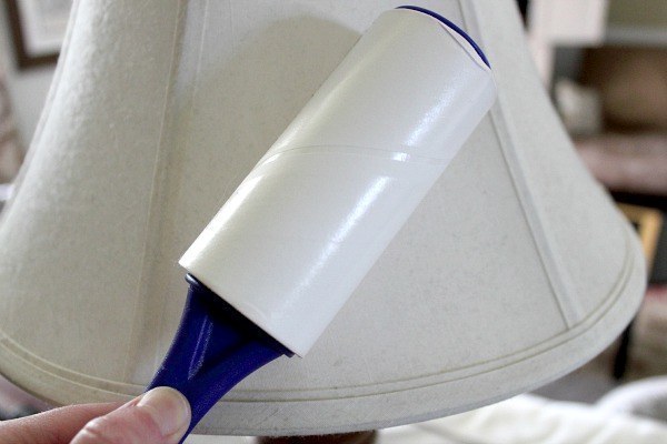 Clean dust off of your lampshades and pillows with a lint roller.