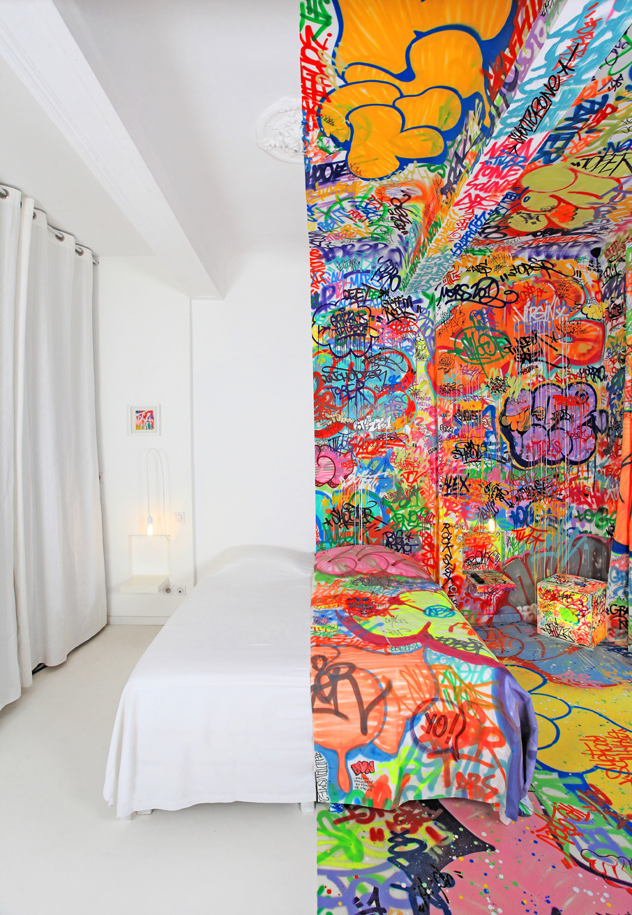 French graffiti artist Tilt has swamped one half of a Marseille hotel room in decoration, while the other half remains completely blank.