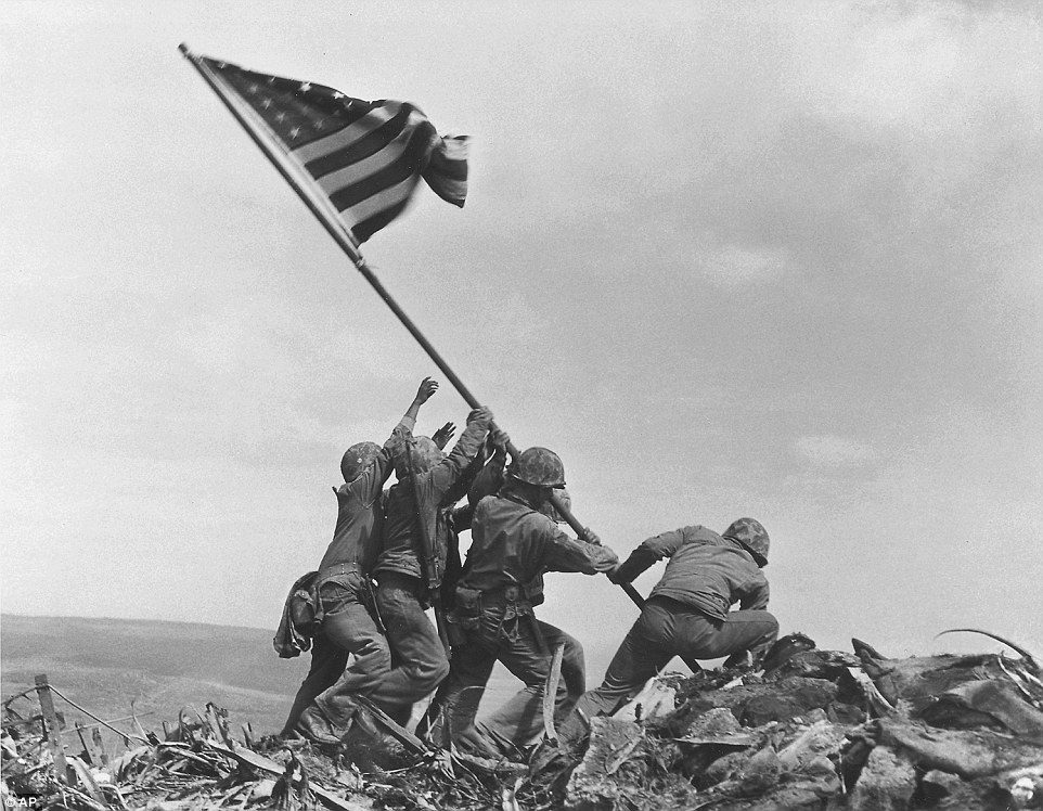 Five US Marines and a Navy sailor were captured raising an American flag atop Mount Suribachi on the Japanese island of Iwo Jima in this photo taken on February 23, 1945. It triggered a wave of national hope that Japanese forces would soon be defeated and led to millions of Americans buying war bonds, helping to win the Second World War