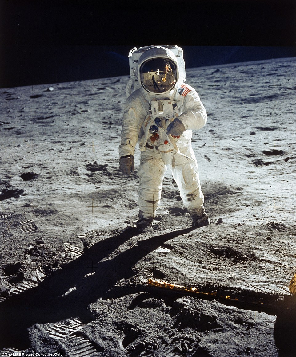 July 20, 1969: Apollo 11 astronaut Buzz Aldrin stands on the moon, with Neil Armstrong and the lunar module reflected in his helmet visor during the historic first walk on the lunar surface. Nineteen minutes earlier, Armstrong had been the first person ever to step foot on the moon, declaring 'That's one small step for man, one giant leap for mankind'. The achievement marked the pinnacle of the space race with fellow superpower, Russia - and showcased the superiority of American technology. The Apollo project is seen as an important early step in the exploration of the solar system