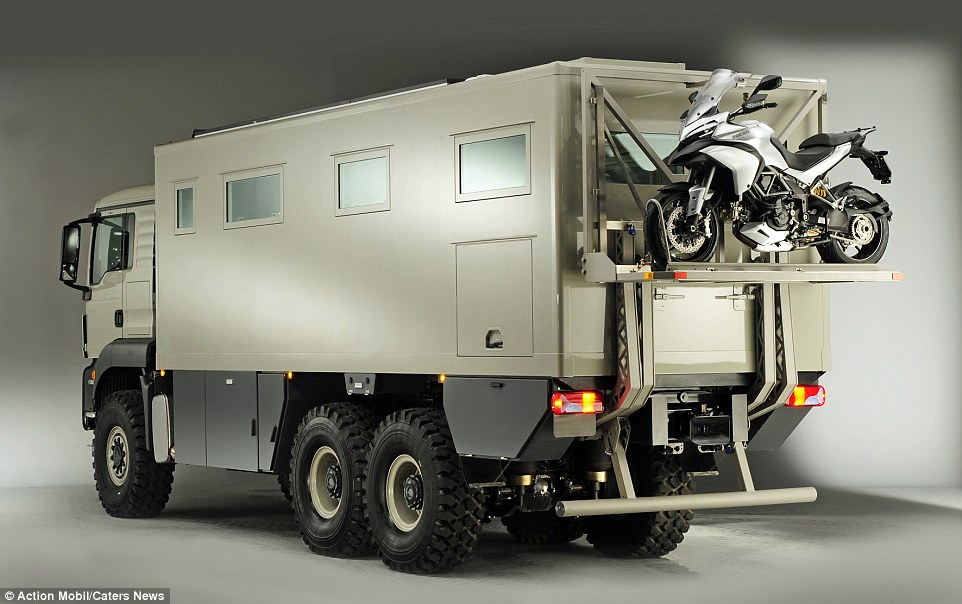 Power: The camper van looks more like a military vehicle and is so big it can easily carry a motorbike on the back on a special platform