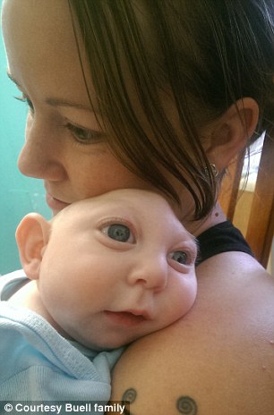 Brittany Buell holds her son, Jaxon, who beat the odds after being born with rare disease