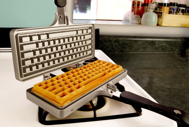 A waffle iron in the shape of a keyboard.