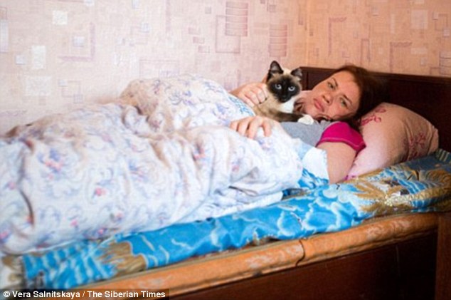 Victims: Photographer Vera Salnitskaya spent a night in the village earlier this year and was told of the bizarre symptoms that the residents suffered over the last few years
