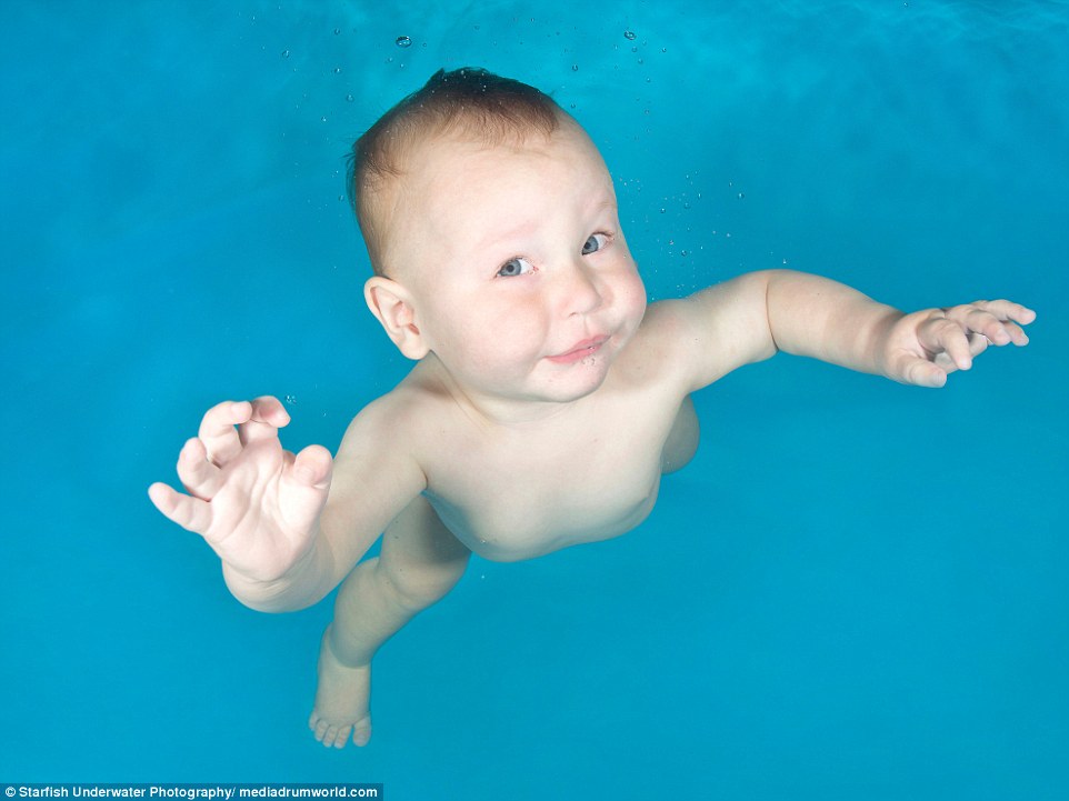 Jacob, one, at an underwater photo shoot with Little Fishes Swim School in Hertfordshire