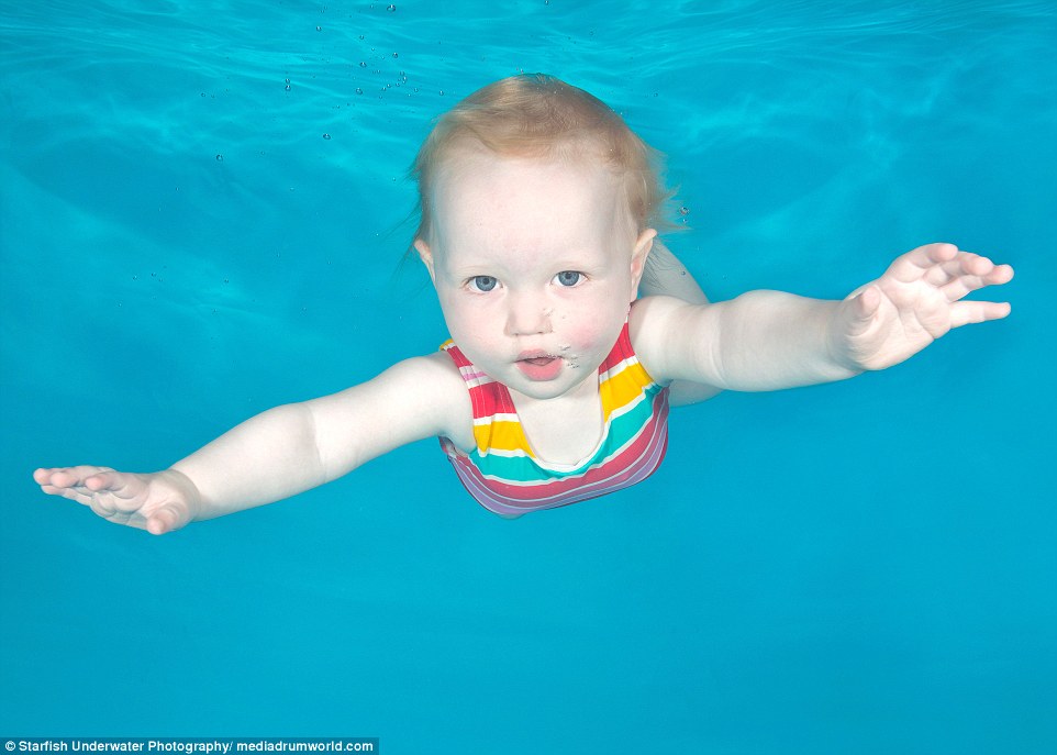 Eloise, one, at an underwater photo shoot at Hydro at the Barn in Lancashire captured by Lucy, who says her second favourite thing to photograph is primates and monkeys - but wishes they would go underwater