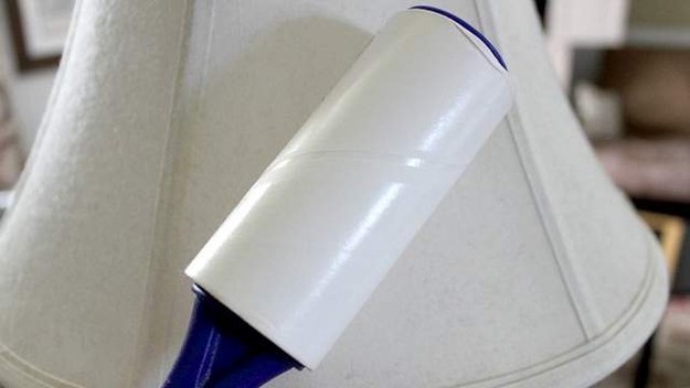 Use a lint roller to clean your lampshade.