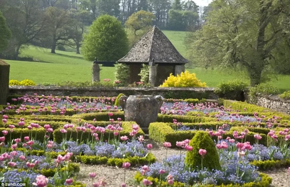 Colourful: Its surrounding gardens were designed by the Edwin Lutyens, regarded as one of the country’s finest landscape architects