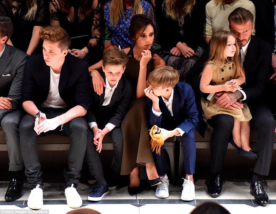 Fashionable family: The Beckhams are pictured with their children (from left) Brooklyn, 16, Cruz, 10, Romeo, 13, and Harper, four
