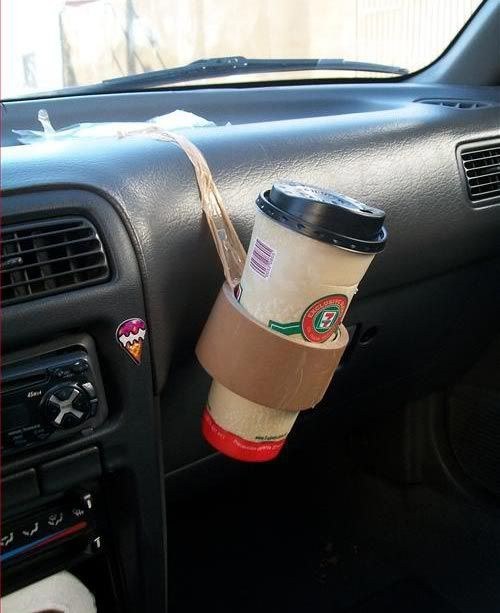 No cupholder in your car? Create your own using a roll of parcel tape.