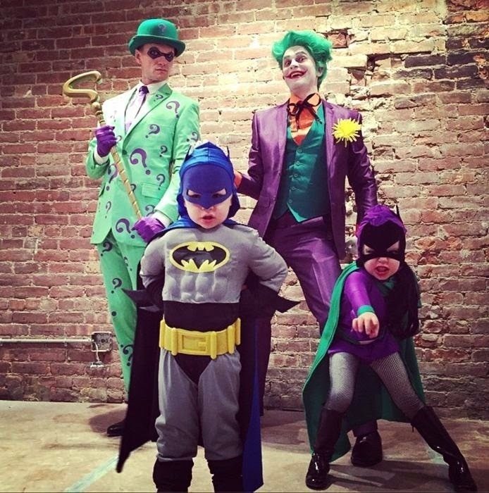 Neil Patrick Harris as the Riddler, husband David Burtka as the Joker, and their kids as  Batman and Batgirl.