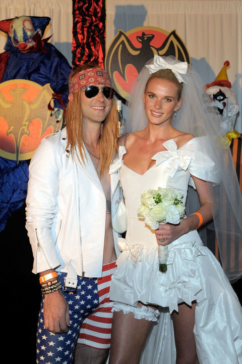 Adam Levine and Annie V as Axl Rose and Stephanie Seymour from the music video "November Rain."