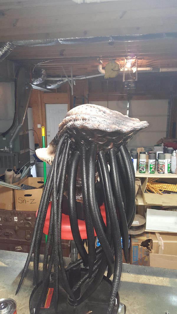"Each dread was made using some all purpose weather striping heated over the eye of a stove and rolled to size. Once cooled they were plasti dipped."