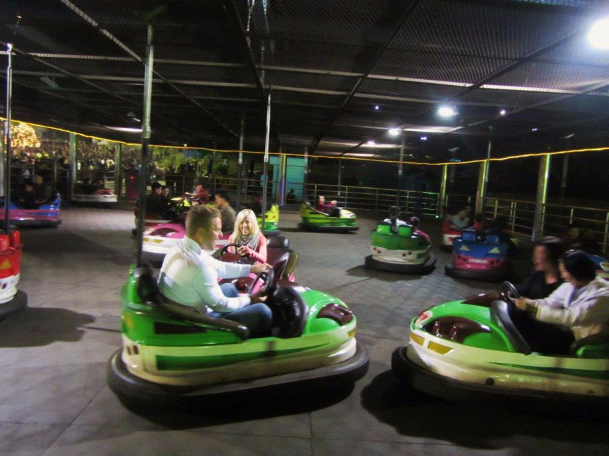 Back in Pyongyang, they went to a 'Fun Fair' that had roller coasters, bumper cars and a target practice competition with locals. It's usually restricted to 'elites,' but they got to go... with at least half a dozen guard and minders in tow.