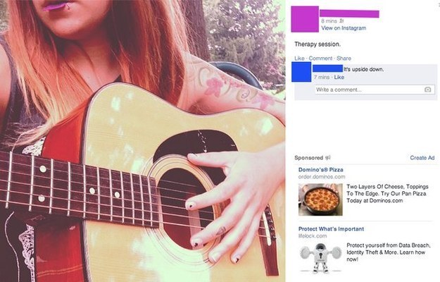 When a musician uploaded a photo of herself holding a guitar. Upside down.