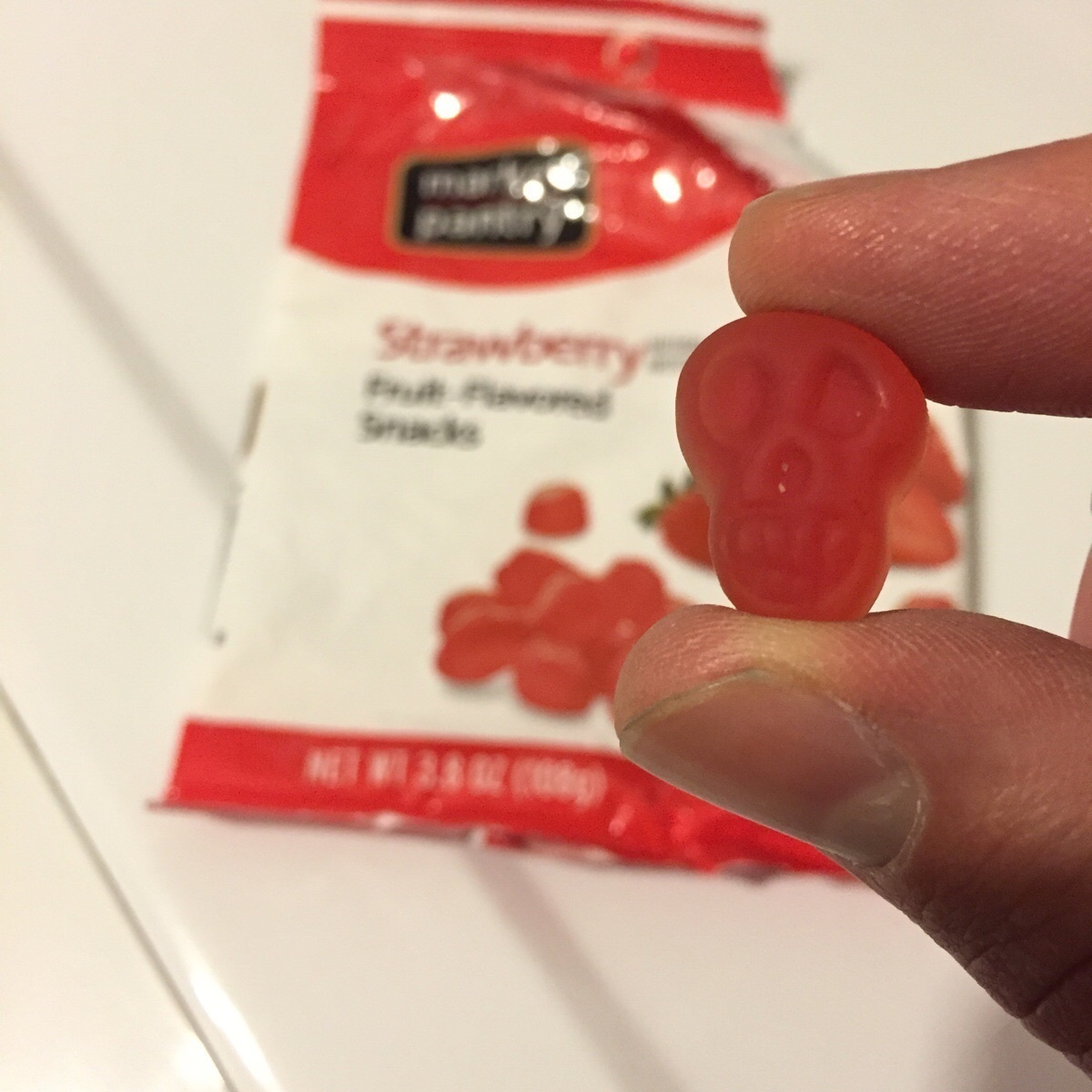 The strawberry fruit snack that looks like a skull.