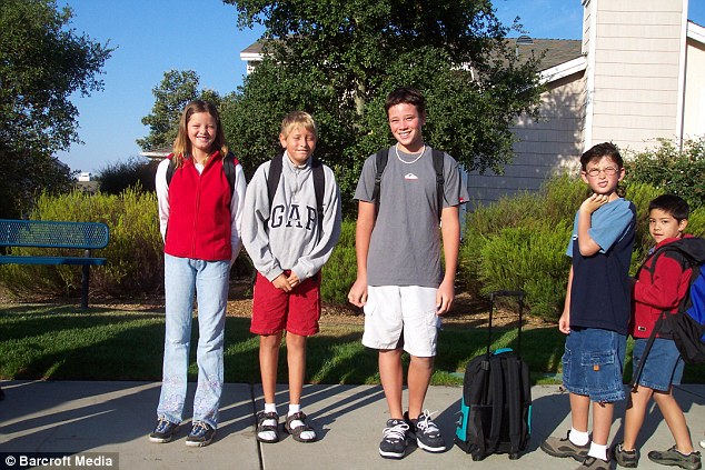 Strike a pose: Chase was as tall as her brothers Devin and Shane - even when they were in elementary school