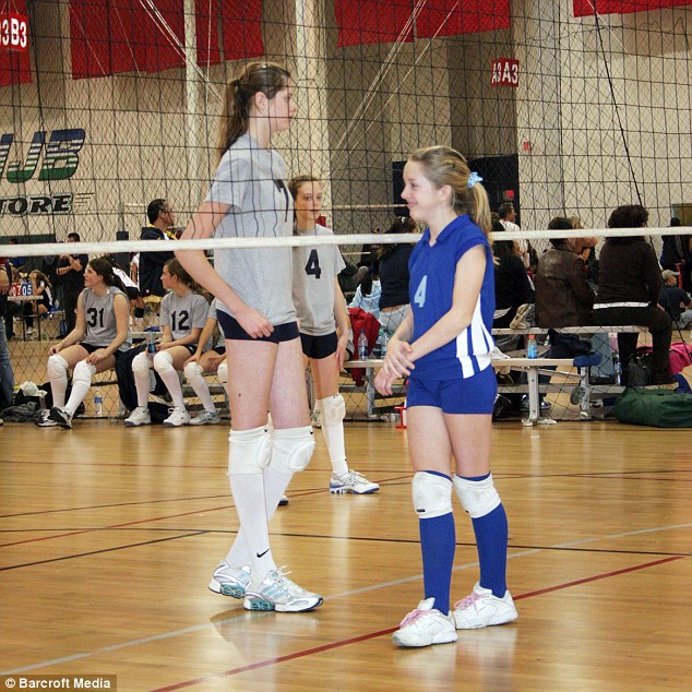 Natural advantage: Chase (left) can be seen towering over the opposition during a middle school volleyball game