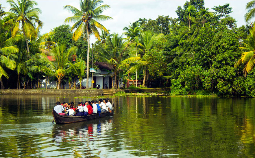 These students pack a tiny row boat to get to class in Kerala, India.