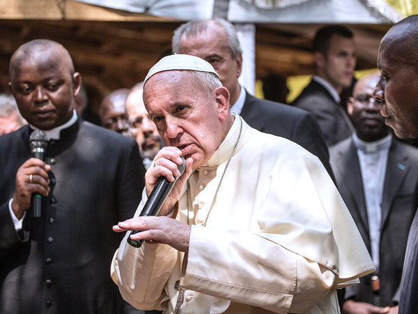 This photo was taken during the pope's visit to the Central African Republic on Sunday as he gave his blessing. This photo of il papa "blessing the mic" struck internet gold first in the form of #PopeBars on twitter and then the photoshoppers on reddit got involved: